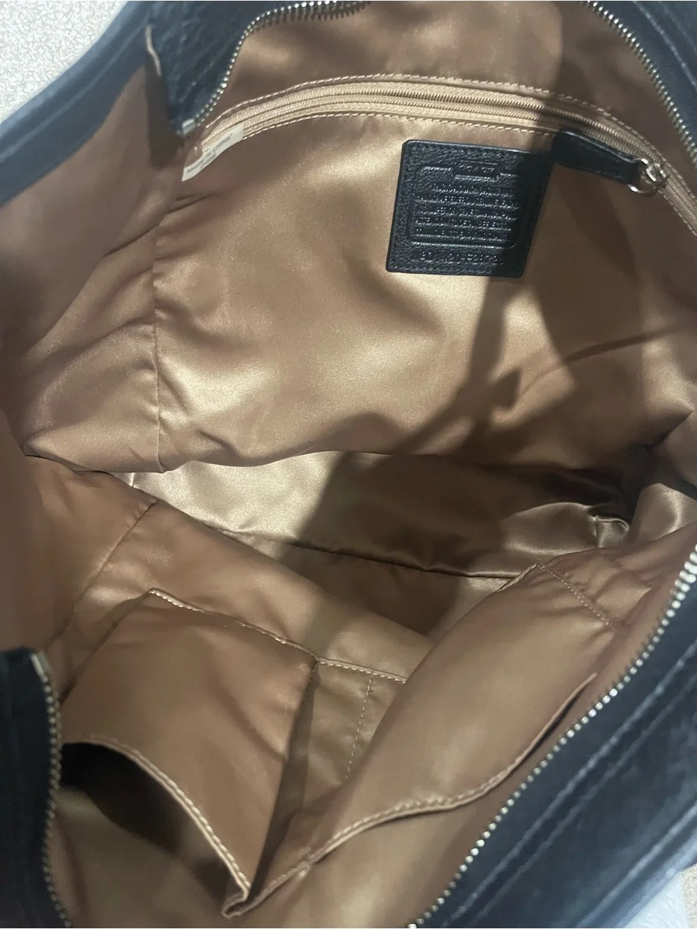 Coach Black Leather Tote with Brown Charm
